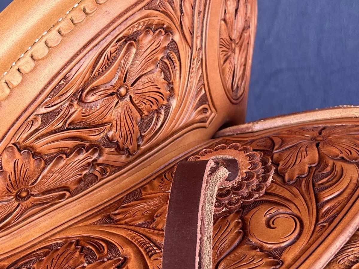 Hand-carved floral pattern part-way through the tooling process